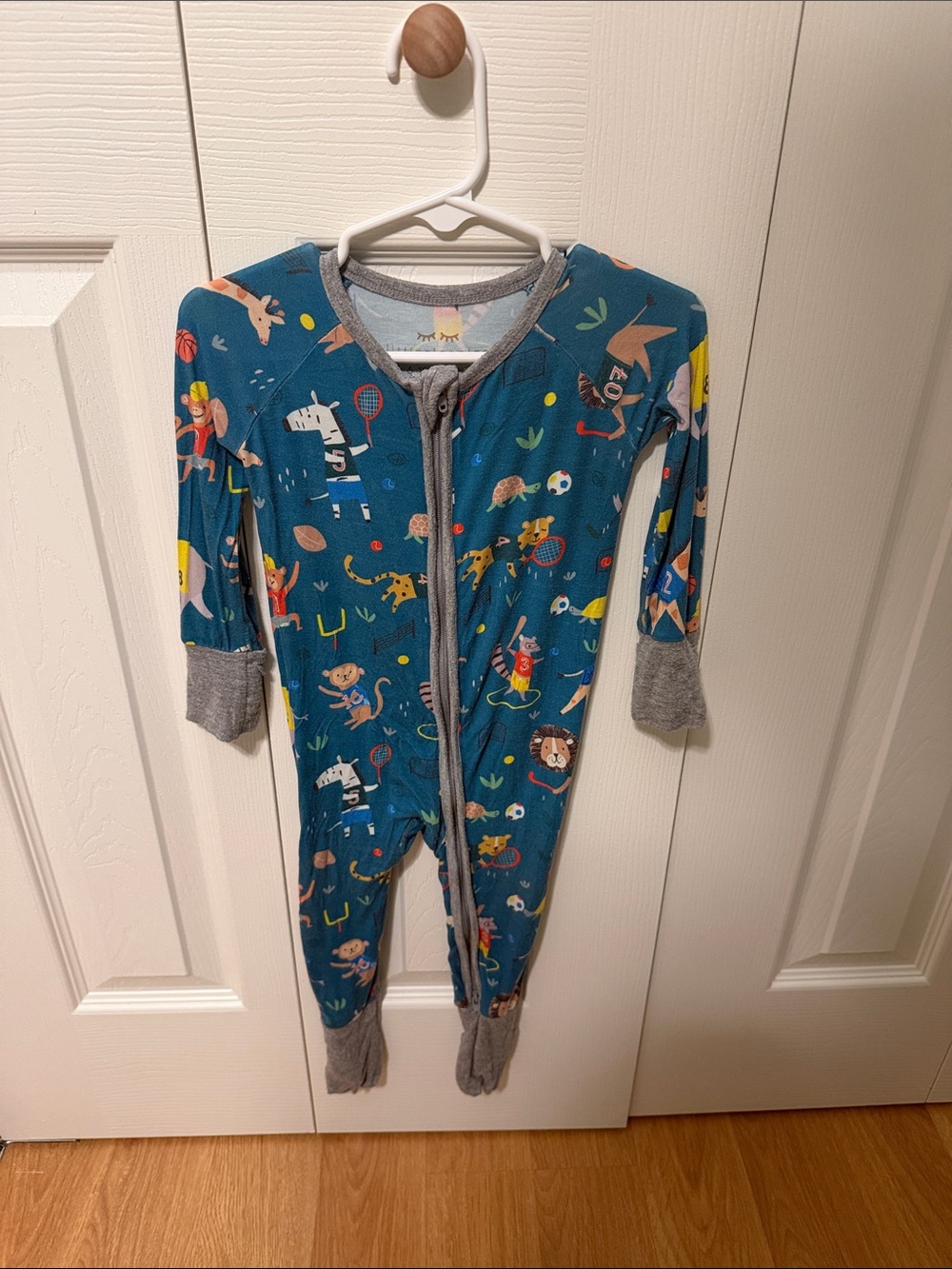 Little Sleepies Blue Footed One-Piece Pajama with Animal Sports Print